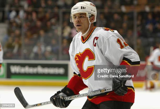 Jarome Iginla of the Calgary Flames watches the action against the Toronto Maple Leafs at Air Canada Centre on January 13, 2004 in Toronto, Ontario....
