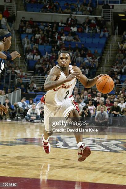 Dajuan Wagner of the Cleveland Cavaliers drives against Josh Howard of the Dallas Mavericks February 18, 2004 at Gund Arena in Cleveland, Ohio. NOTE...