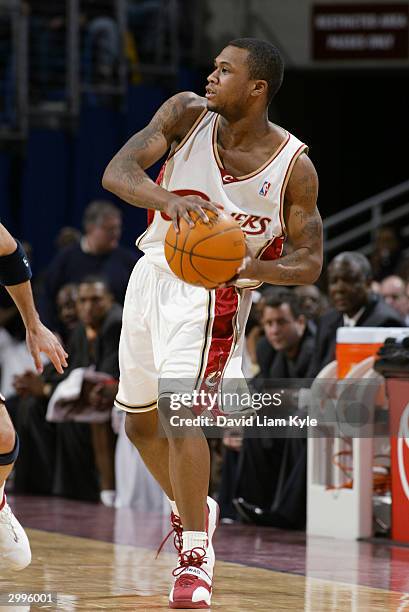Dajuan Wagner of the Cleveland Cavaliers holds the ball during the game against the New Jersey Nets at Gund Arena on February 11, 2004 in Cleveland,...