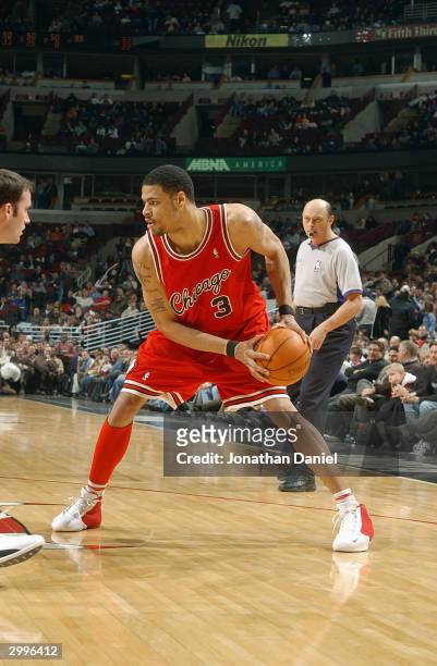 Tyson Chandler of the Chicago Bulls looks to drive during the game against the Indiana Pacers at the United Center on February 10, 2004 in Chicago,...