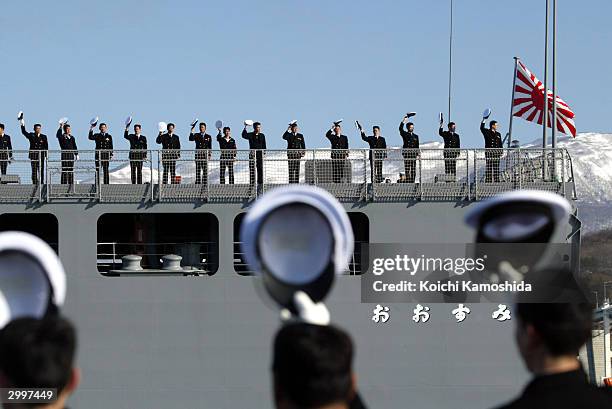 Japan's 8,900-ton Maritime Self-Defense Force supply ship Oosumi leaves Muroran port escorted by the 4,550-ton destroyer Murasame bound for Kuwait...