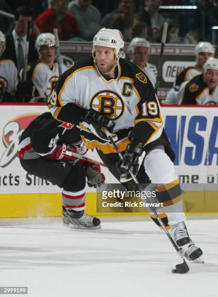 Joe Thornton of the Boston Bruins controls the puck during the game against the Buffalo Sabres on January 15, 2004 at HSBC Arena in Buffalo, New...