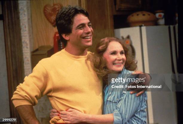 American actor Tony Danza hugs actor Katherine Helmond in a still from the television series, 'Who's The Boss,' circa 1986.