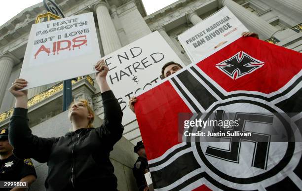 Anti-gay demostrators stand in front of pro-gay marriage supporters signs in front of San Francisco City Hall February 20, 2004 in San Francisco,...