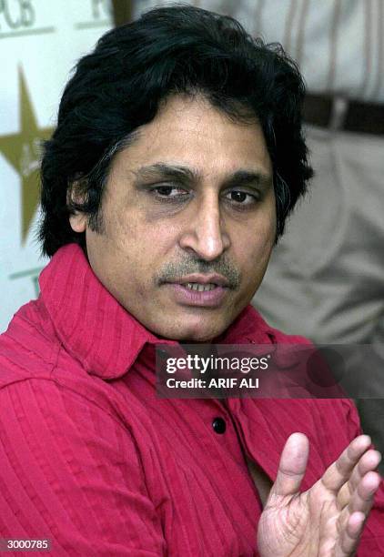 Pakistan Cricket Board chief executive Ramiz Raja gestures as he speaks during a a press conference in Lahore, 21 February 2004. Raja said the Indian...