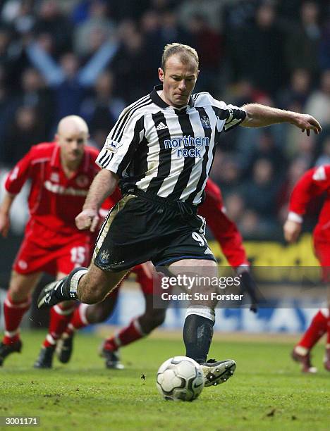Newcastle striker Alan Shearer scores for Newcastle from the penalty spot during the FA Barclaycard Premiership match between Newcastle United and...