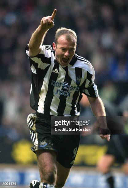Newcastle striker Alan Shearer celebrates after scoring for Newcastle from the penalty spot during the FA Barclaycard Premiership match between...