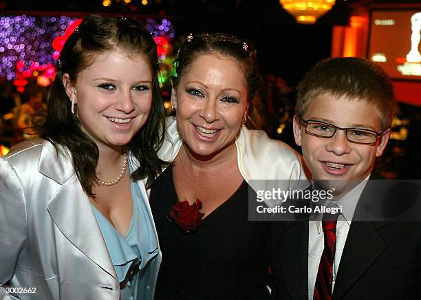 Actor Jonathon Lipnicky his sister Alexis with their mother Rhonda attend the 6th Annual Costume Guild Awards reception at the Beverly Hilton Hotel...