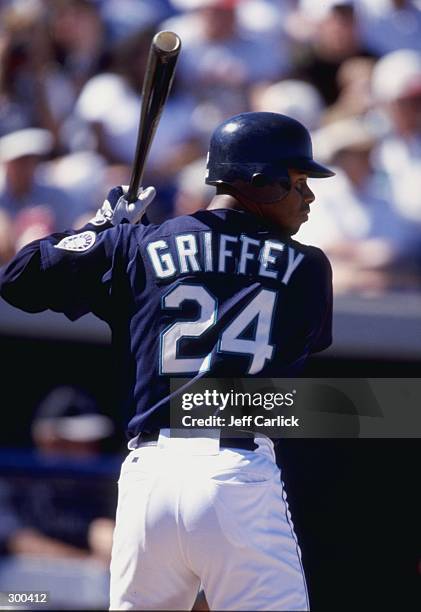 Outfielder Ken Griffey Jr. Of the Seattle Mariners in action during a spring training game against the Anaheim Angels at the Peoria Sports Complex in...