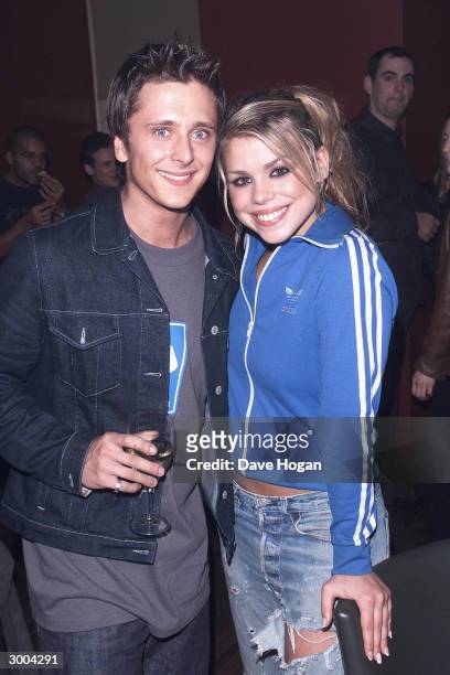 British pop star Billie Piper and boyfriend Richie Neville of the pop group "5ive" attend the TV Hits Awards at Wembley Stadium on October 29, 2000...