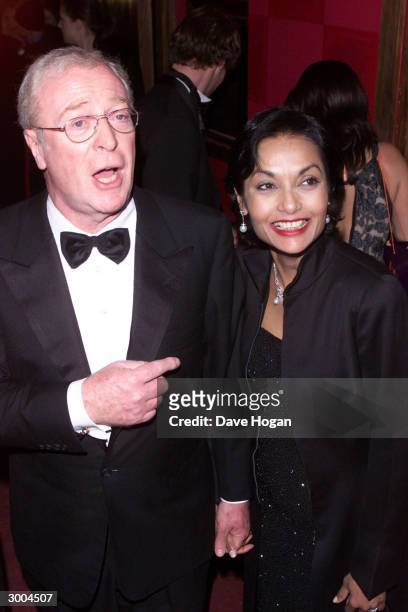 British actor Michael Caine and wife attend the launch party for the film "Charlies Angels" at the Red Cube Club on November 23, 2000 in London.