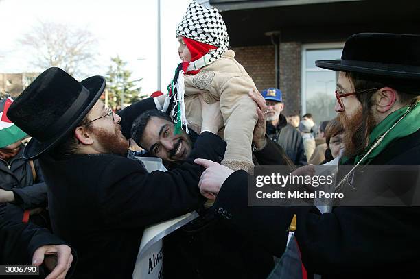 Rabbis protest along with Palestinian demonstrators outside the International Court of Justice February 23, 2004 in The Hague, The Netherlands. A...