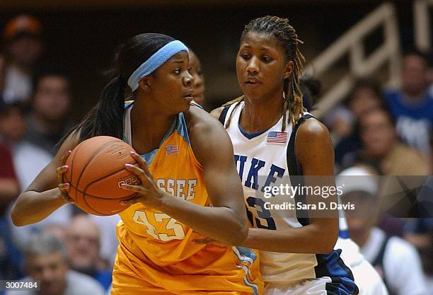 Shyra Ely of the Tennessee Lady Vols looks to play the ball against Iciss Tillis of the Duke Blue Devils during the game on January 24, 2004 at...