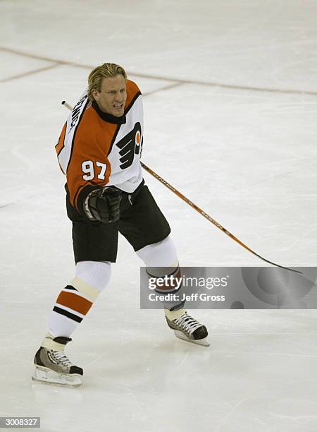 Jeremy Roenick of the Philadelphia Flyers celebrates during the NHL All-Star Super Skills Competition on February 7, 2004 at the Xcel Energy Center...