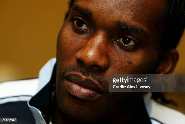Jay Jay Okocha of Bolton Wanderers looks on during the Bolton Wanderers Carling Cup Final Press Conference at The Reebok Stadium on February 24, 2004...