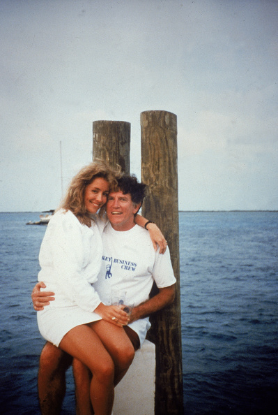 Doman Rice American politician Gary Hart sits on a dock with Donna Rice on his ...