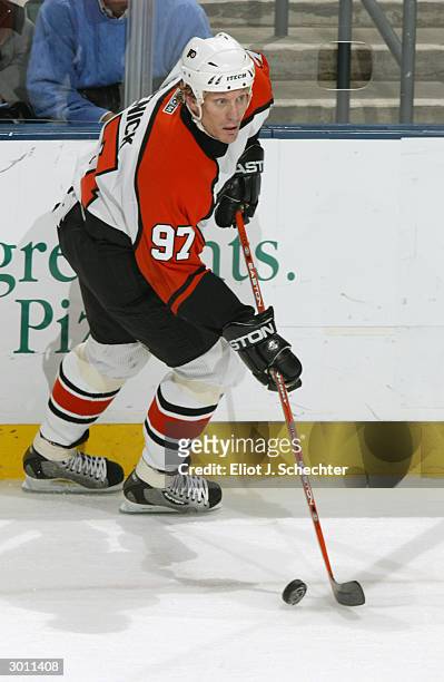 Center Jeremy Roenick of the Philadelphia Flyers advances the puck against the Florida Panthers during the game at the Office Depot Center on January...