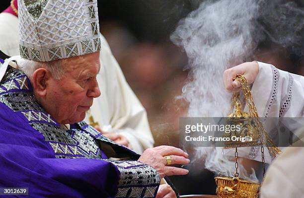Pope John Paul II blesses the ashes at St. Peter?s Basilica during the Ash Wednesday Service February 25, 2004 in the Vatican City. Ash Wednesday is...