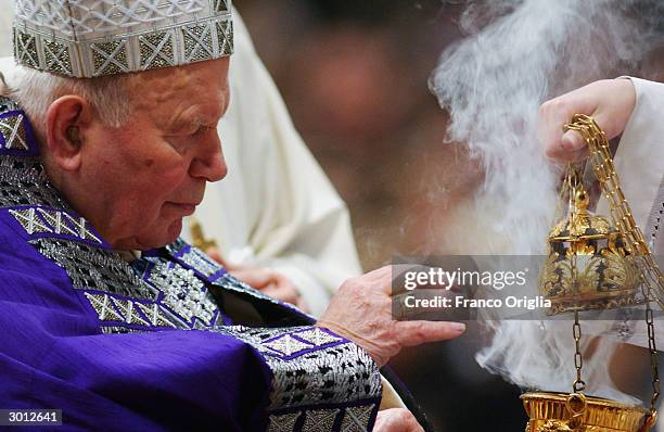 Pope John Paul II blesses the ashes at St. Peter?s Basilica during the Ash Wednesday Service February 25, 2004 in the Vatican City. Ash Wednesday is...