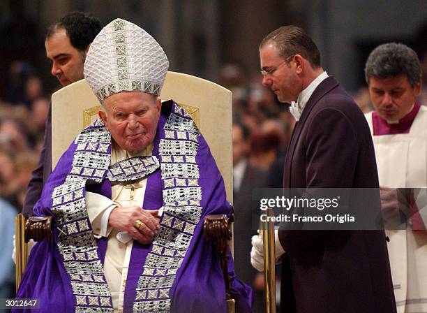 Pope John Paul II attends the Blessing and Imposition of the Ashes at St. Peters Basilica during the Ash Wednesday Service on February 25, 2004 in...