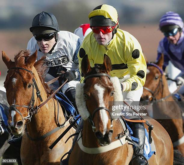 Jockey Tony McCoy races on Jardin Fleuri on his way to winning his first race on his comeback during the The Corve Novices Selling Hurdle Raceat...