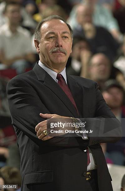 Interim head coach Chris Ford of the Philadelphia 76ers looks on against the Seattle Sonics during the game on February 19, 2004 at Key Arena in...