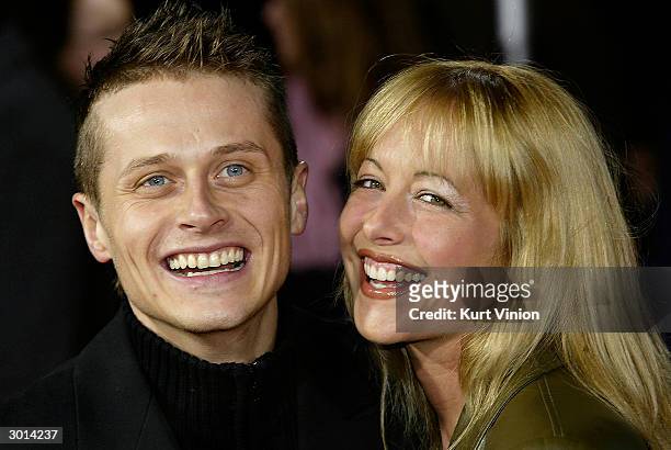 Roman Knizka and his girlfriend attend the German premiere of Gothika with Halle Berry February 25, 2004 in Berlin, Germany.