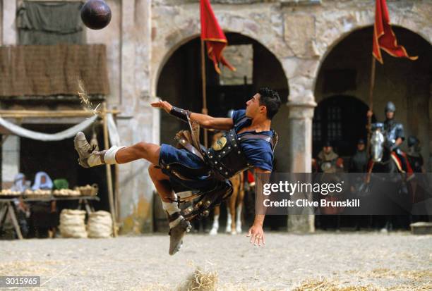 Ricardo Quaresma attempts an overhead kick during the making of the Pepsi football commercial 'Pepsi Foot Battle' held on July 4, 2003 in Madrid,...