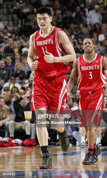 Yao Ming of the Houston Rockets runs up the court during the game against the Dallas Mavericks on February 21, 2004 at American Airlines Center in...