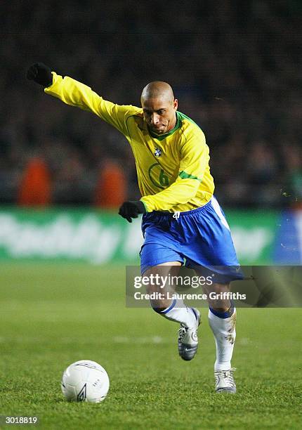 Roberto Carlos of Brazil runs with the ball during the International Friendly match between Republic of Ireland and Brazil held on February 18, 2004...