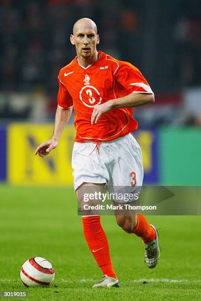 Jaap Stam of Holland brings the ball out of defence during the International Friendly match between Holland and the USA held on February 18, 2004 at...