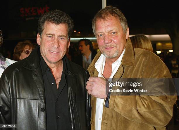 Actors Paul Michael Glaser and David Soul arrive at the premiere of Warner Bros. "Starsky and Hutch" at the Village Theater on February 26, 2004 in...