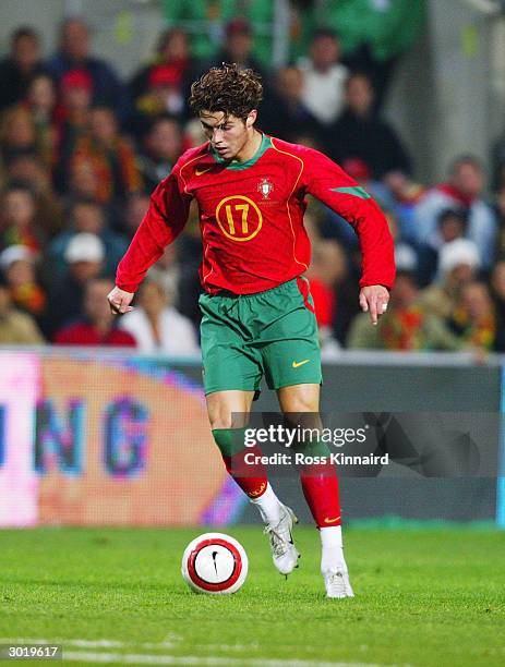 Cristiano Ronaldo of Portugal runs with the ball during the International Friendly match between Portugal and England held on February 18, 2004 at...