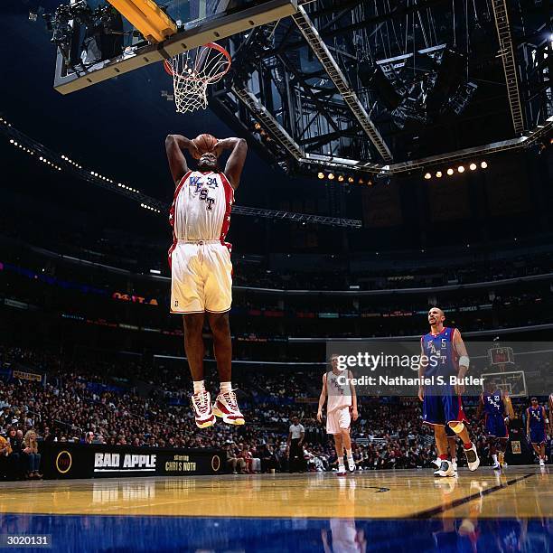 Shaquille O'Neal of the Western Conference All-Stars dunks against the Eastern Conference All-Stars during the 2004 All-Star Game on February 15,...