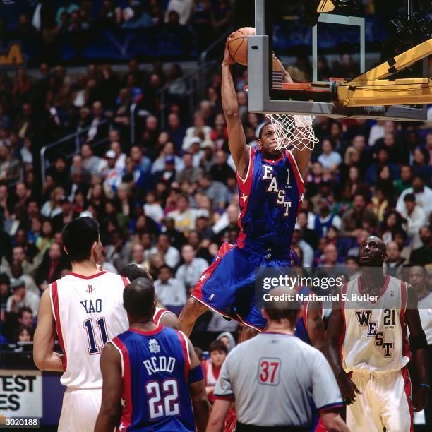 Tracy McGrady of the Eastern Conference All-Stars dunks against the Western Conference All-Stars during the 2004 All-Star Game on February 15, 2004...