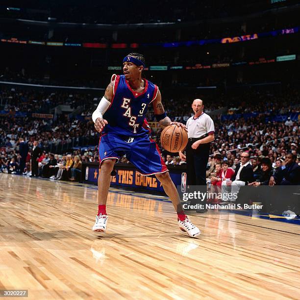 Allen Iverson of the Eastern Conference All-Stars looks to drive against the Western Conference All-Stars during the 2004 All-Star Game on February...