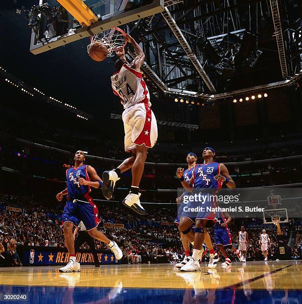 Ray Allen of the Western Conference All-Stars dunks against the Eastern Conference All-Stars during the 2004 All-Star Game on February 15, 2004 at...