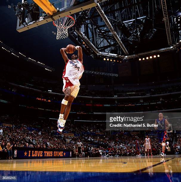 Kobe Bryant of the Western Conference All-Stars dunks against the Eastern Conference All-Stars during the 2004 All-Star Game on February 15, 2004 at...