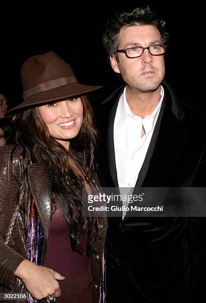 Actress Tia Carrere and Simon Wakelin attend the Opening Night Performance of "Afterbirth: Kathy and Mo's Greatest Hits", February 27, 2004 at Canon...