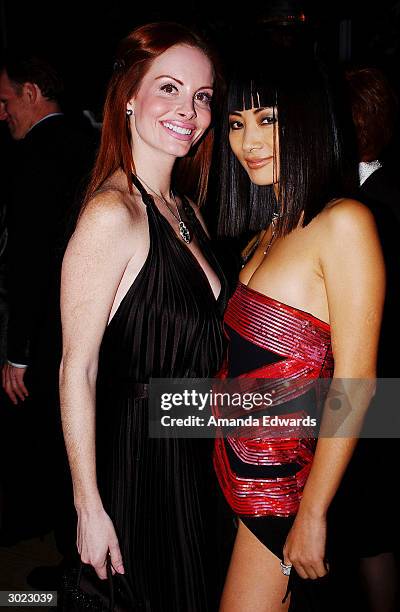 Actresses Phoebe Price and Bai Ling pose at the Angeleno Magazine and Lion Gates' pre-Oscar party February 27, 2004 at the Skybar in West Hollywood,...