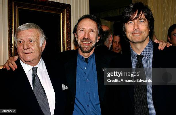 Host John Cacavas, event chair Charles Bernstein and composer Thomas Newman attend the champagne reception honoring the Academy Award Music Nominees...