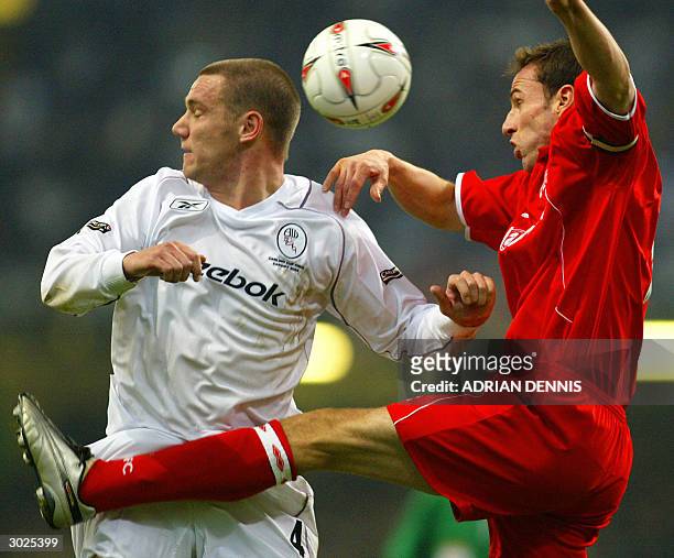 Bolton's Kevin Nolan and Middlesbrough's Gareth Southgate fight for a head ball during the Carling Cup Final football match 29 February, 2004 in...