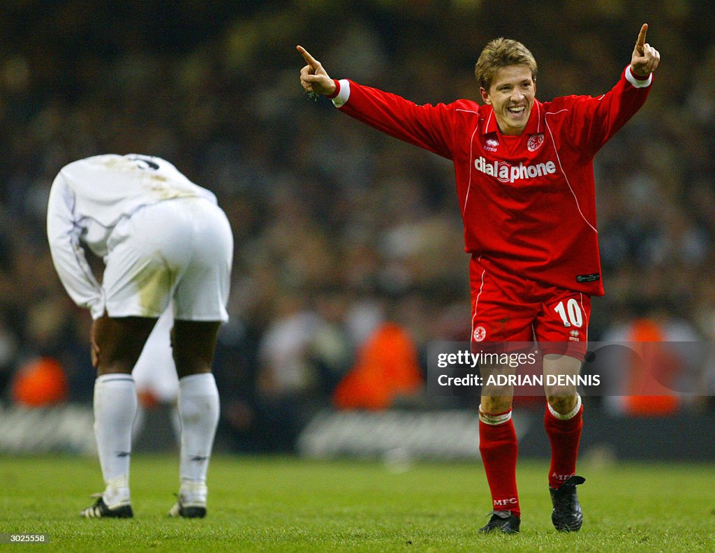Middlesbrough's Juninho (R) celebrates h