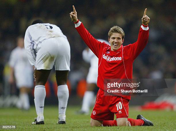 Juninho of Middlesbrough celebrates Middlesbrough's victory over Bolton Wanderers during the Carling Cup Final match between Bolton Wanderers and...