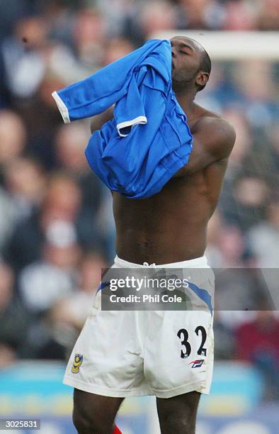 Lomana LuaLua of Portsmouth prays after he scores their goal during the FA Barclaycard Premiership match between Portsmouth and Newcastle United at...