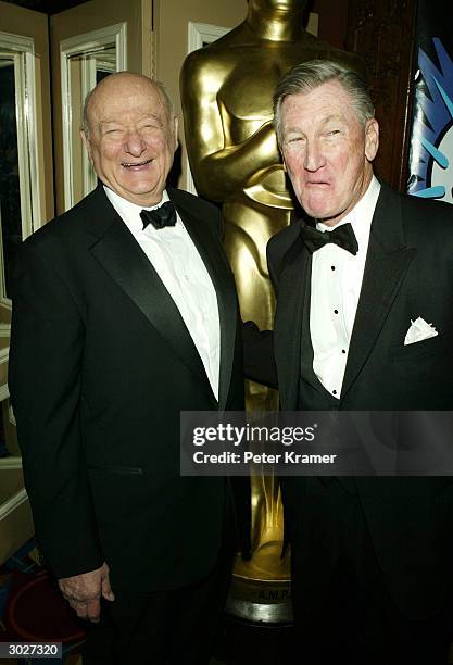 Former New York City Mayor Ed Koch and producer Robert Rehme attend the AMPAS Official Oscar Night Celebration at Le Cirque February 29, 2004 in New...