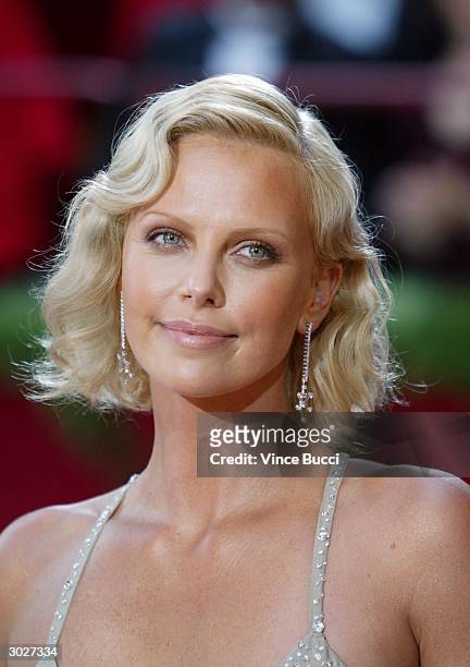 Actress Charlize Theron attends the 76th Annual Academy Awards on February 29, 2004 at the Kodak Theater, in Hollywood, California.