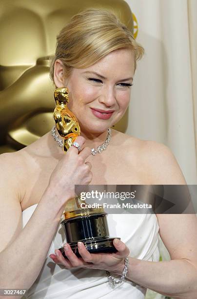 Actress Renee Zellweger poses with her Oscar for Best Supporting Actress during the 76th Annual Academy Awards at the Kodak Theater on February 29,...