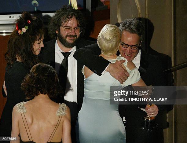 United States: Director Peter Jackson celebrates with Fran Walsh Howard Shore and Annie Lennox as they accept the Oscar for Best Song during the 76th...