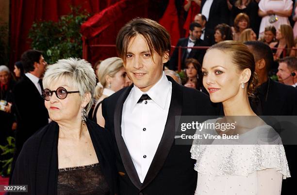 Actor Johnny Depp , mother Betty Sue Palmer and girlfriend Vanessa Paradis attend the 76th Annual Academy Awards on February 29, 2004 at the Kodak...
